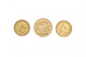 Three gold sovereigns