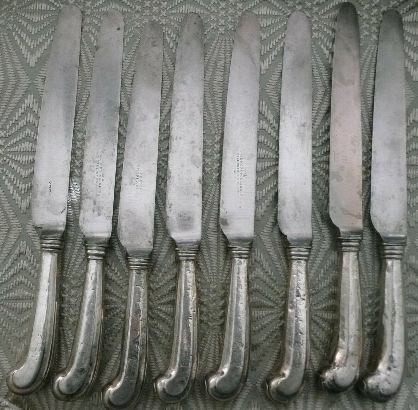 Eight George III period Silver Pistol Grip Table Knives, English circa 1760.