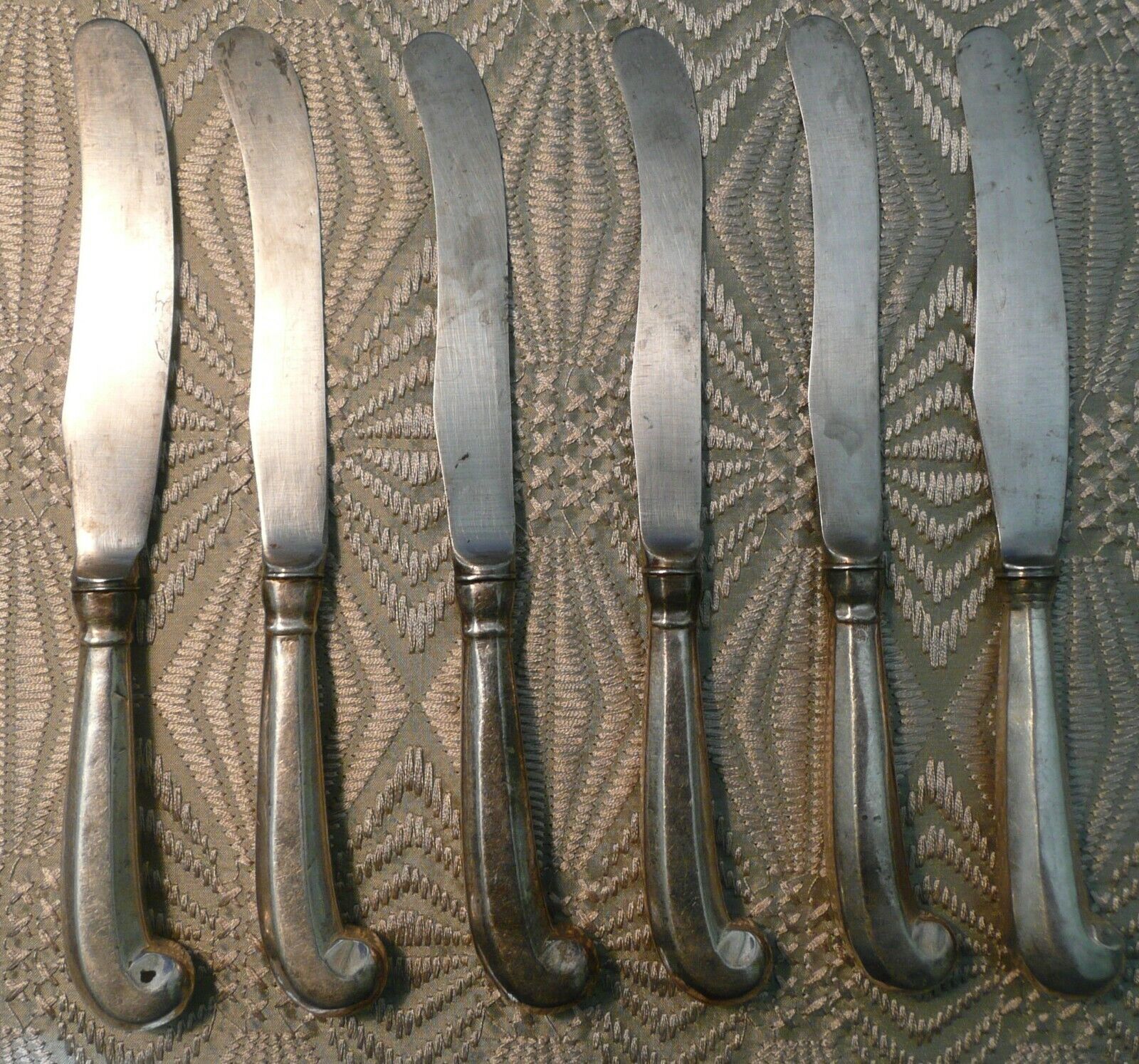 Six Fine George II period Silver Pistol Grip Desert Knives, English circa 1722