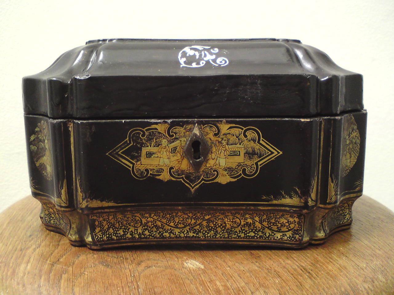 Chinese Qing small octagonal gilt lacquer tea caddy with pewter canisters