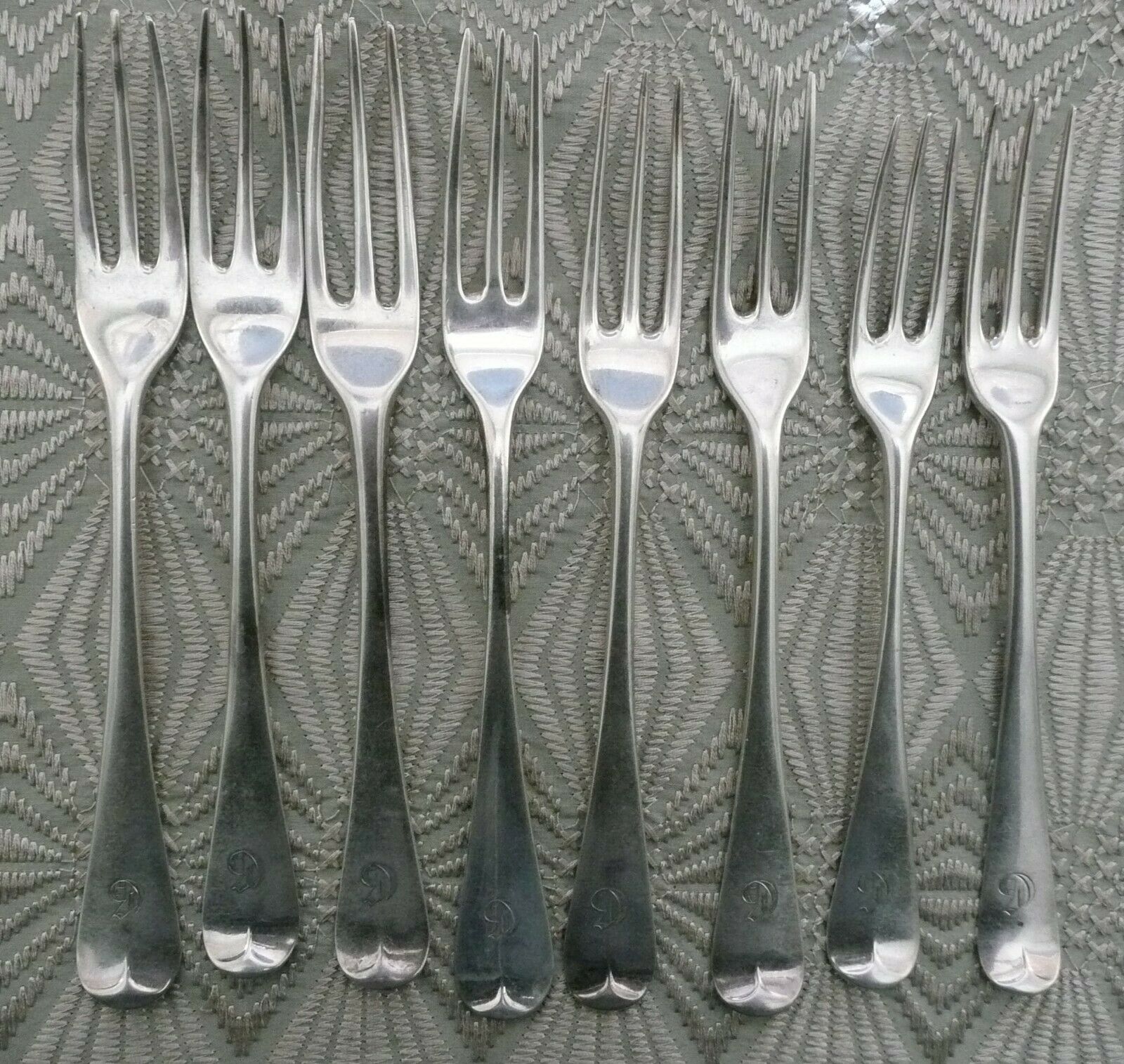 Eight George II period Silver Forks, London circa 1750