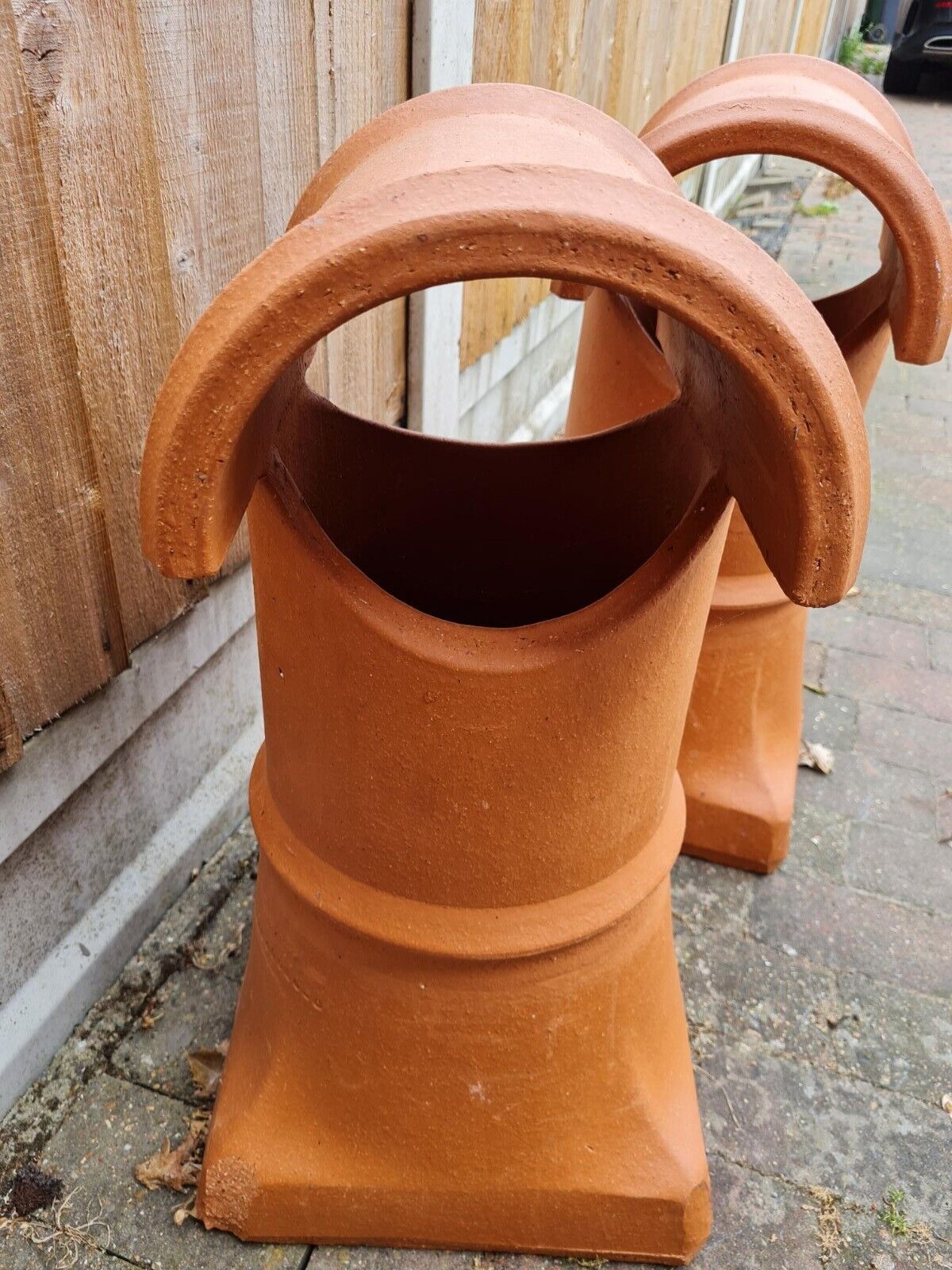 clay chimney pots  hooded brand new , great garden ornament 