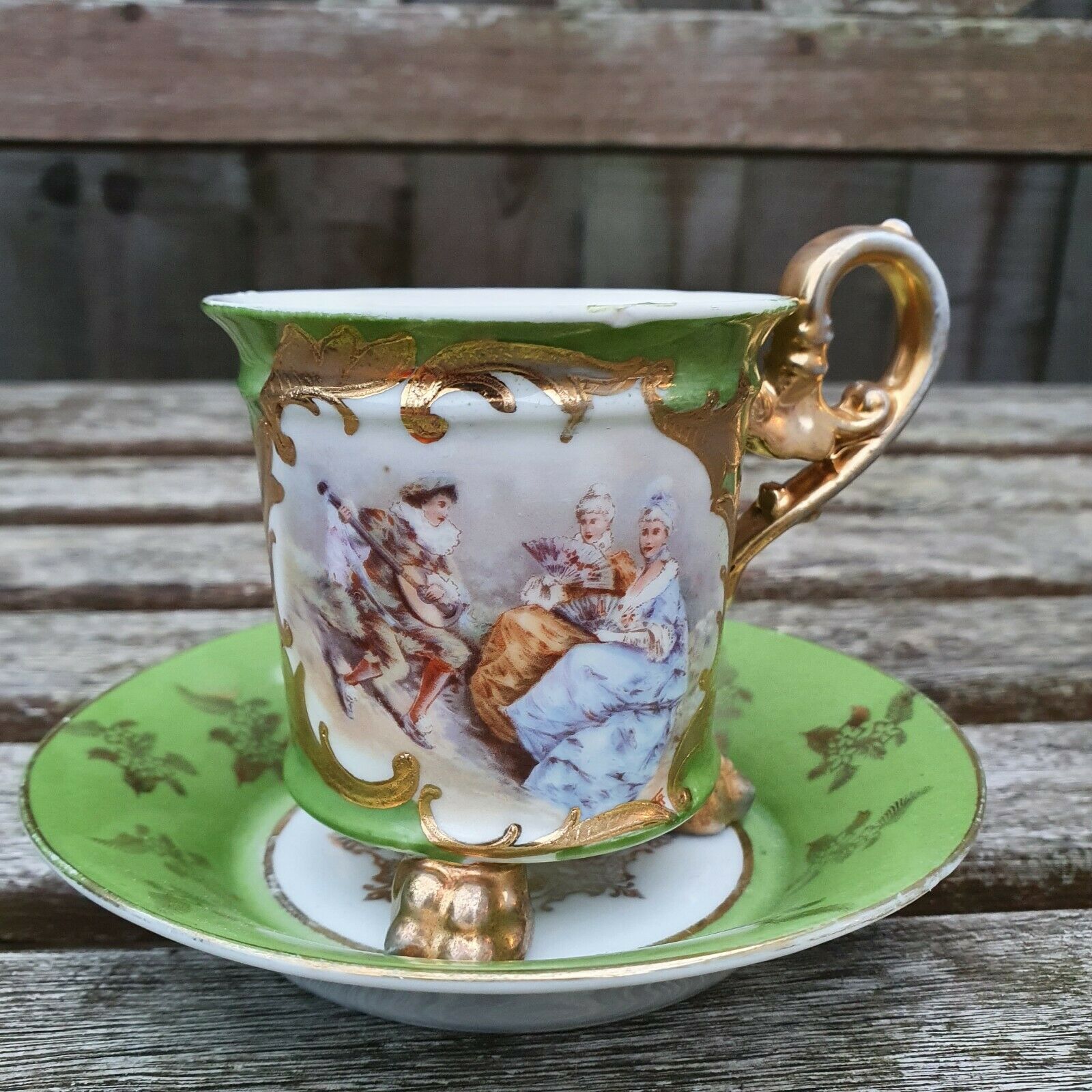 Victoria Carlsbad Austria Hand Painted Footed Tea Cup & Saucer gold & green RARE