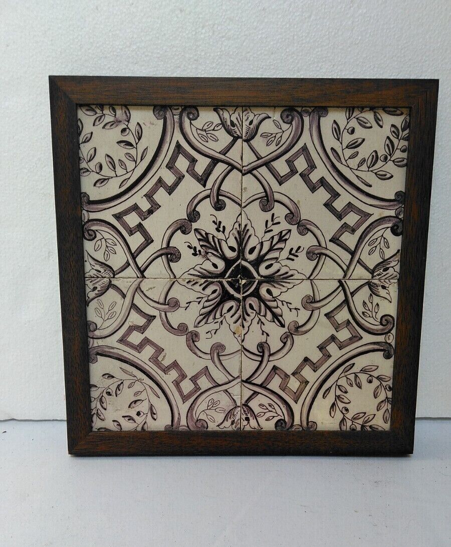 Framed panel of 4 handmade, hand painted antique Delft manganese tiles c 1800.
