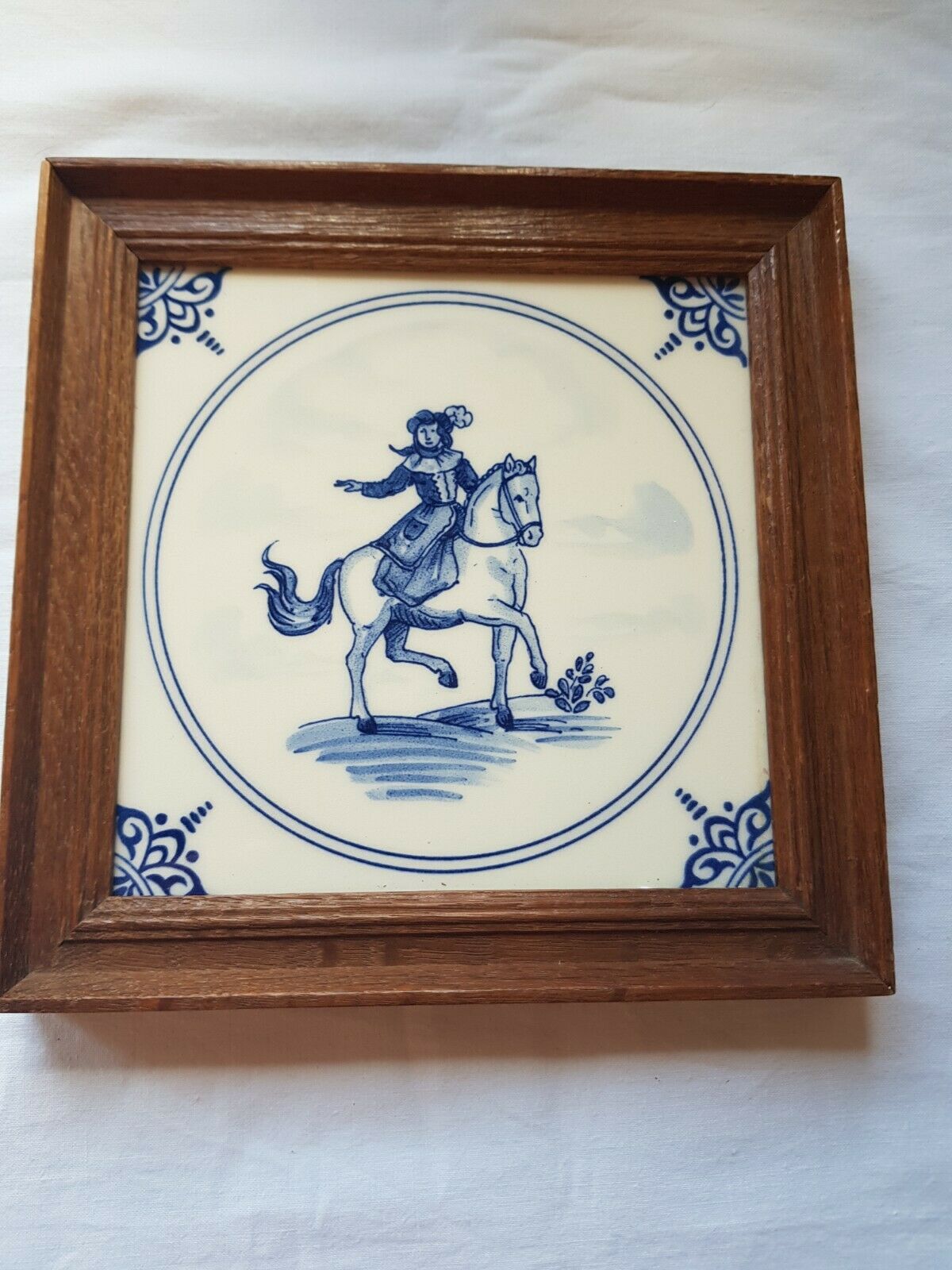 Framed Antique Delft blue tile depicting a Man on horseback