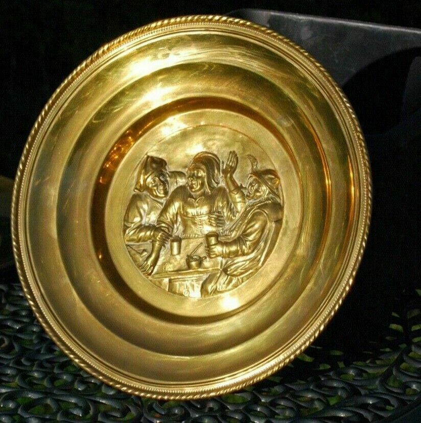 Substantial brass charger wall plate plaque 14 inches across, impressed scene