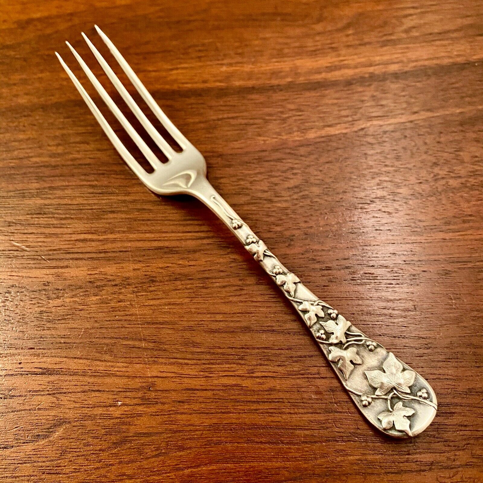 Antique Valuations: RARE TIFFANY AESTHETIC STERLING SILVER DESSERT FORK: APPLIED VINE & CURRANT