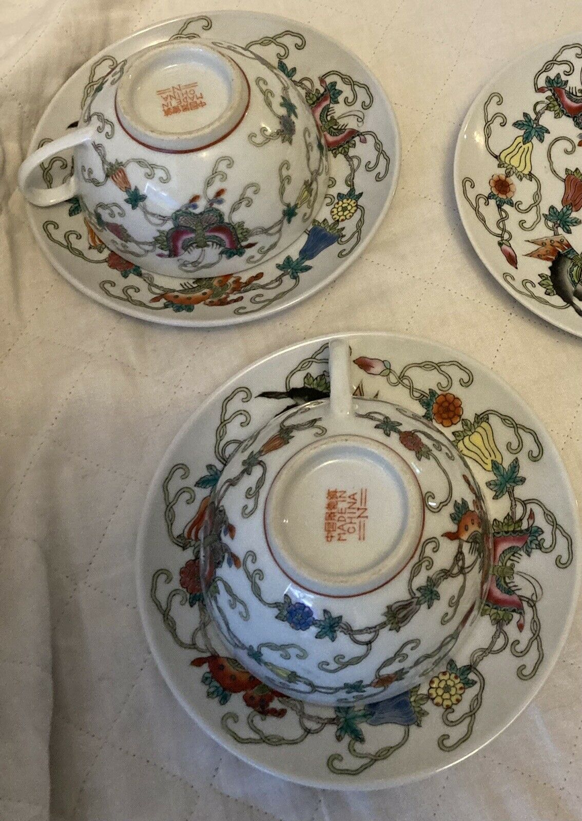 Antique Valuations: Two Chinese famille rose butterfly moth and gourd plates And Cups