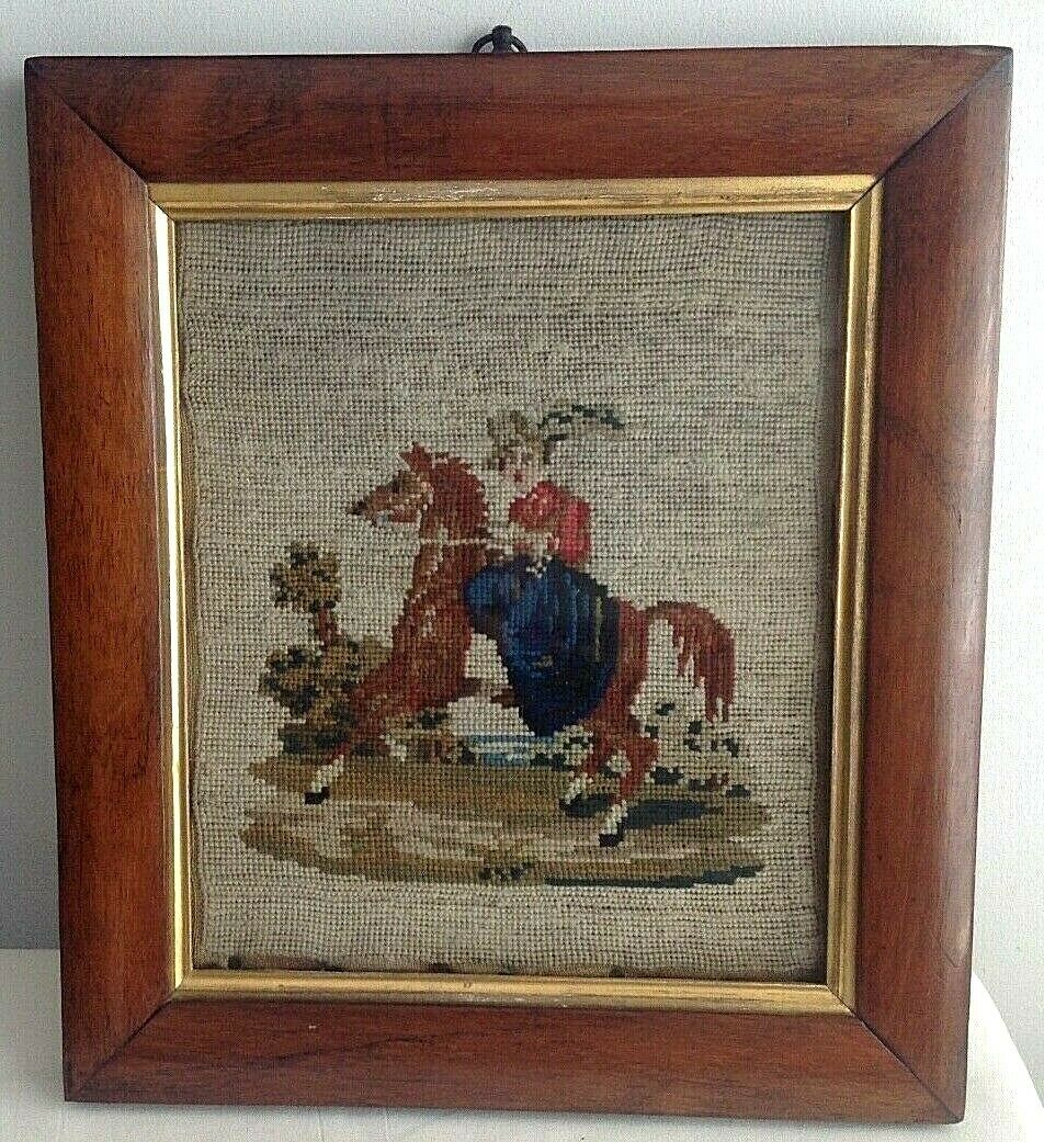 Antique Valuations: Antique 19th century Victorian needlepoint lady on prancing pony walnut frame