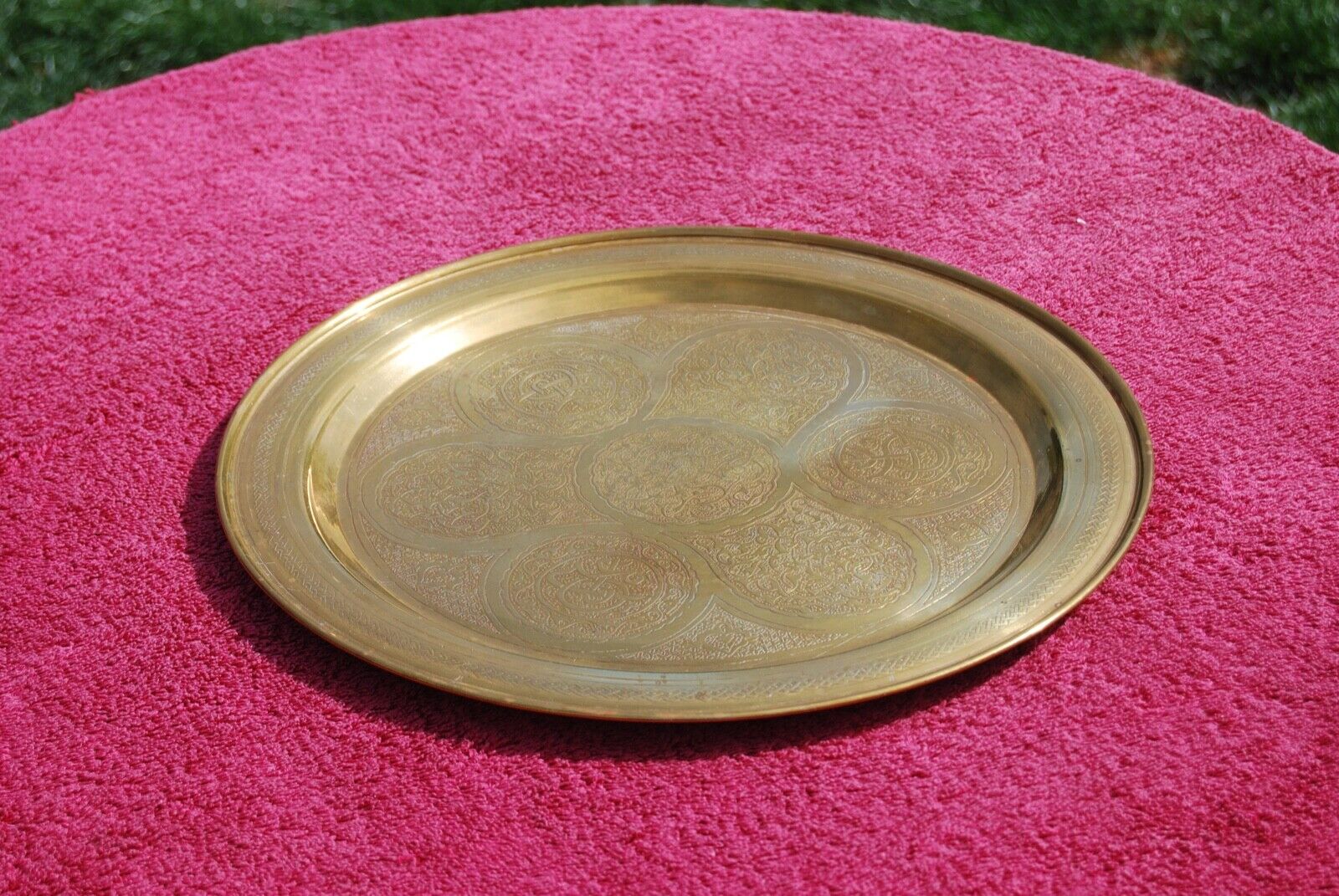 Antique Valuations: Engraved or etched brass tray or plate dish charger