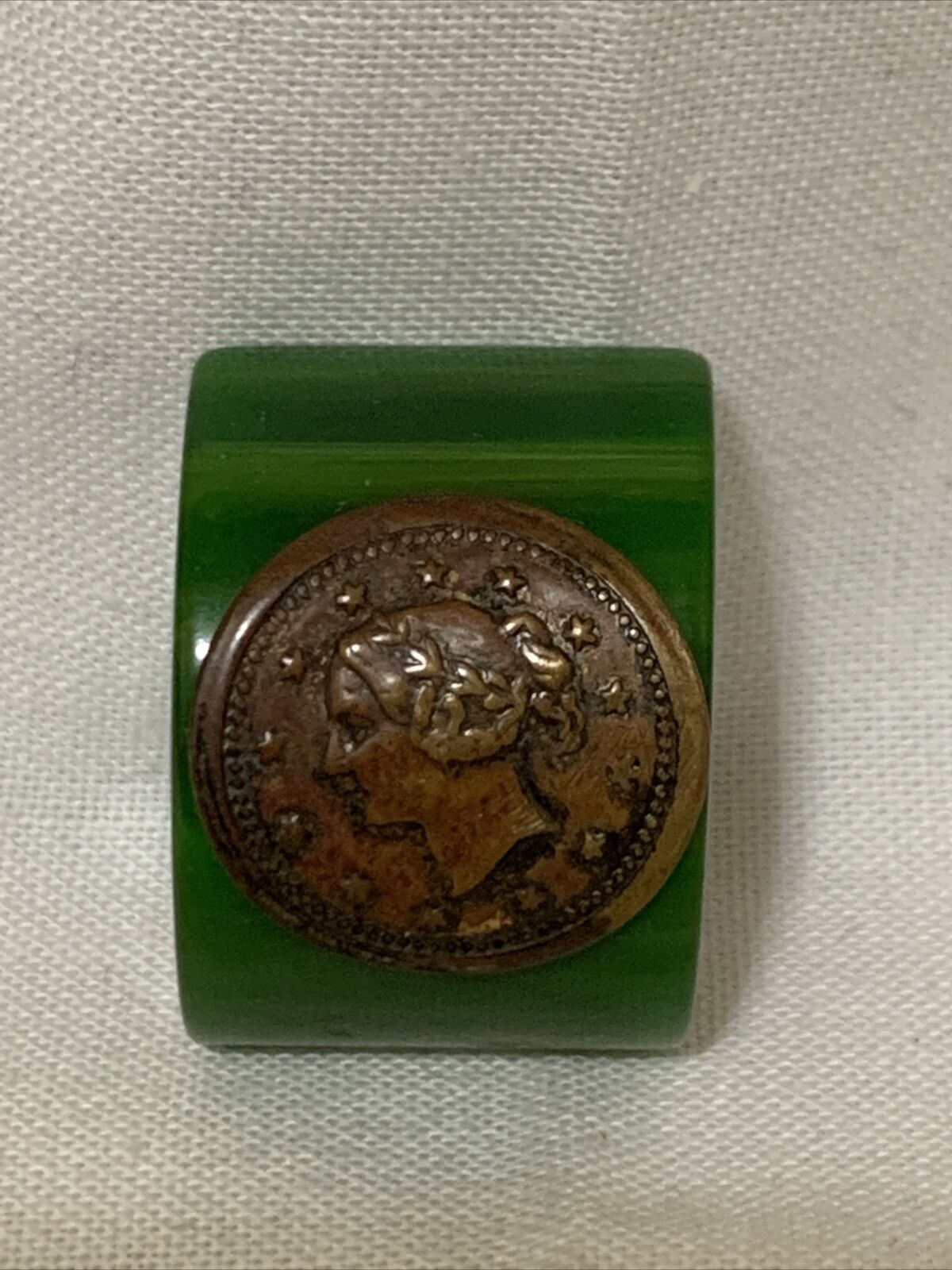 Antique Valuations: Antique Bakelite button￼ Of Coin