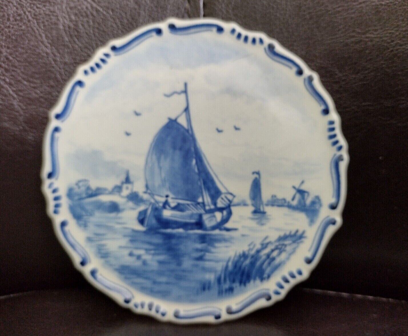Antique Valuations: DELFT WARE DUTCH BLUE AND WHITE SMALL PLATE PLAQUE