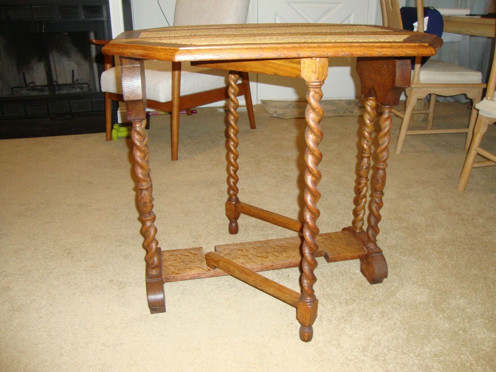 Antique Valuations: Oak Drop Leaf Table w/ Cane Accented Top Beautiful