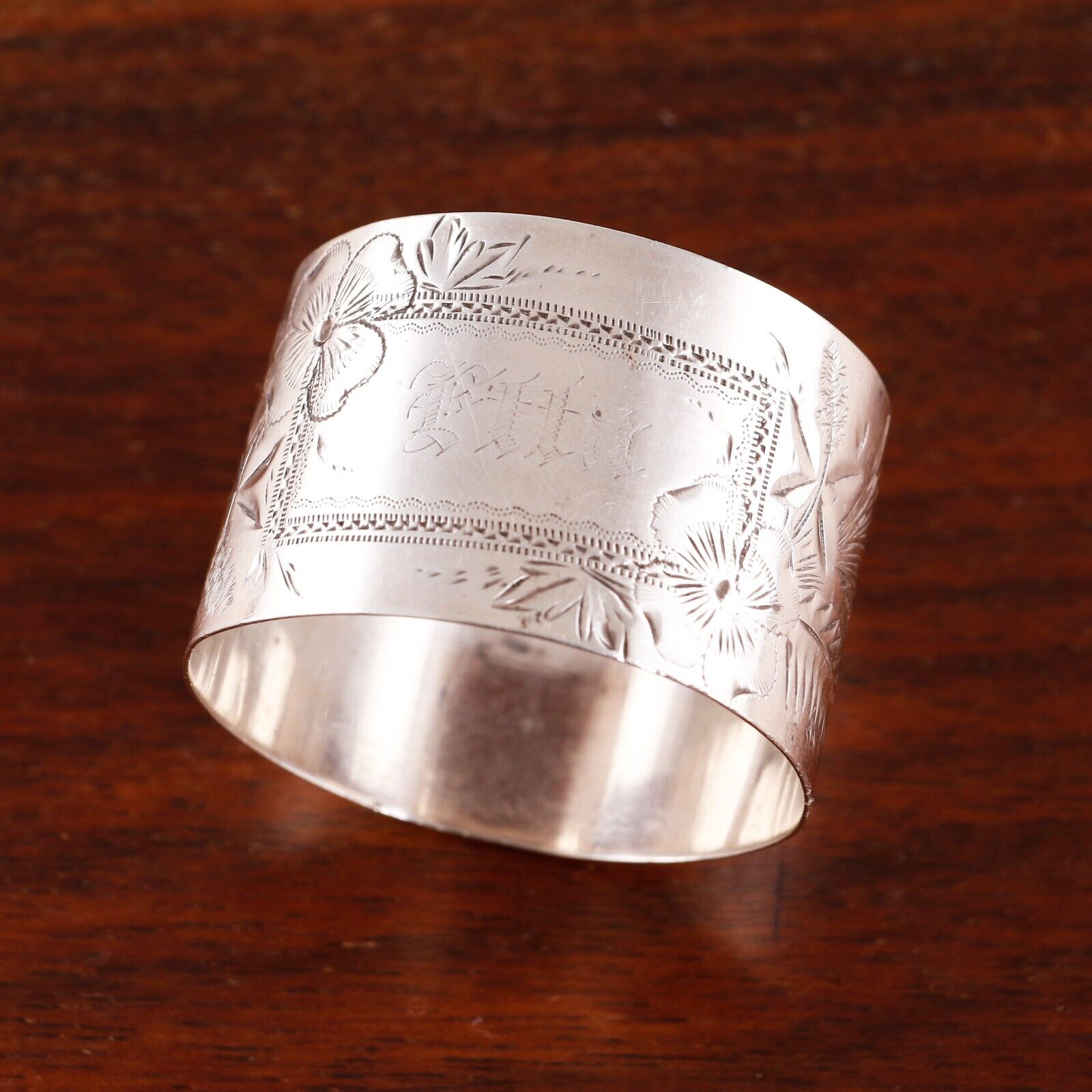 Antique Valuations: N G WOOD AESTHETIC STERLING SILVER NAPKIN RING FLORALS & FOLIATE MONOGRAM ETTA