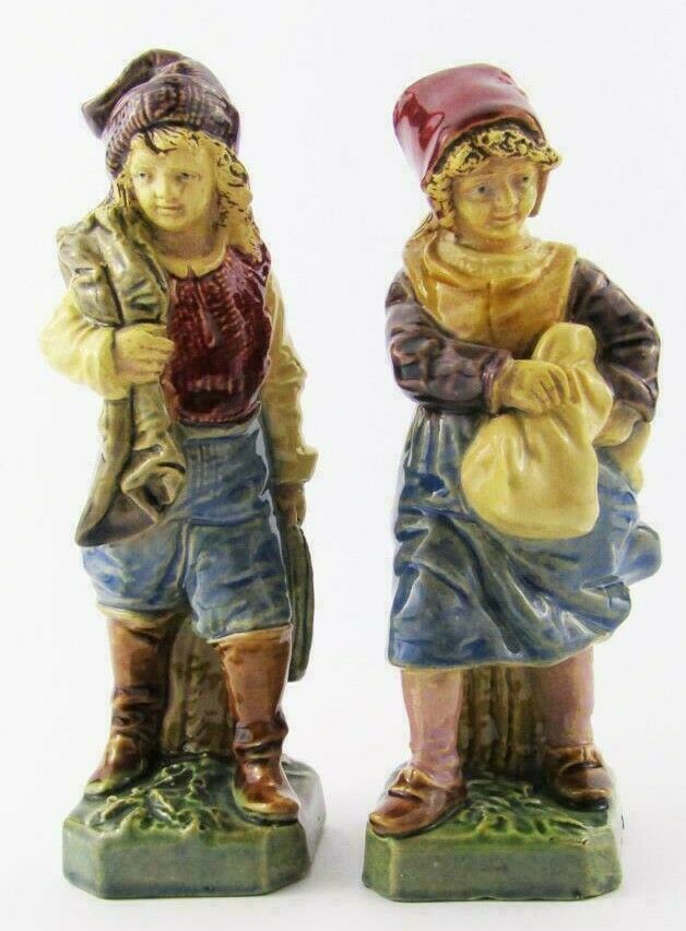 Antique Valuations: Pair of 19th Century Continental Bohemian Pottery Majolica Figures by Urbach Brothers