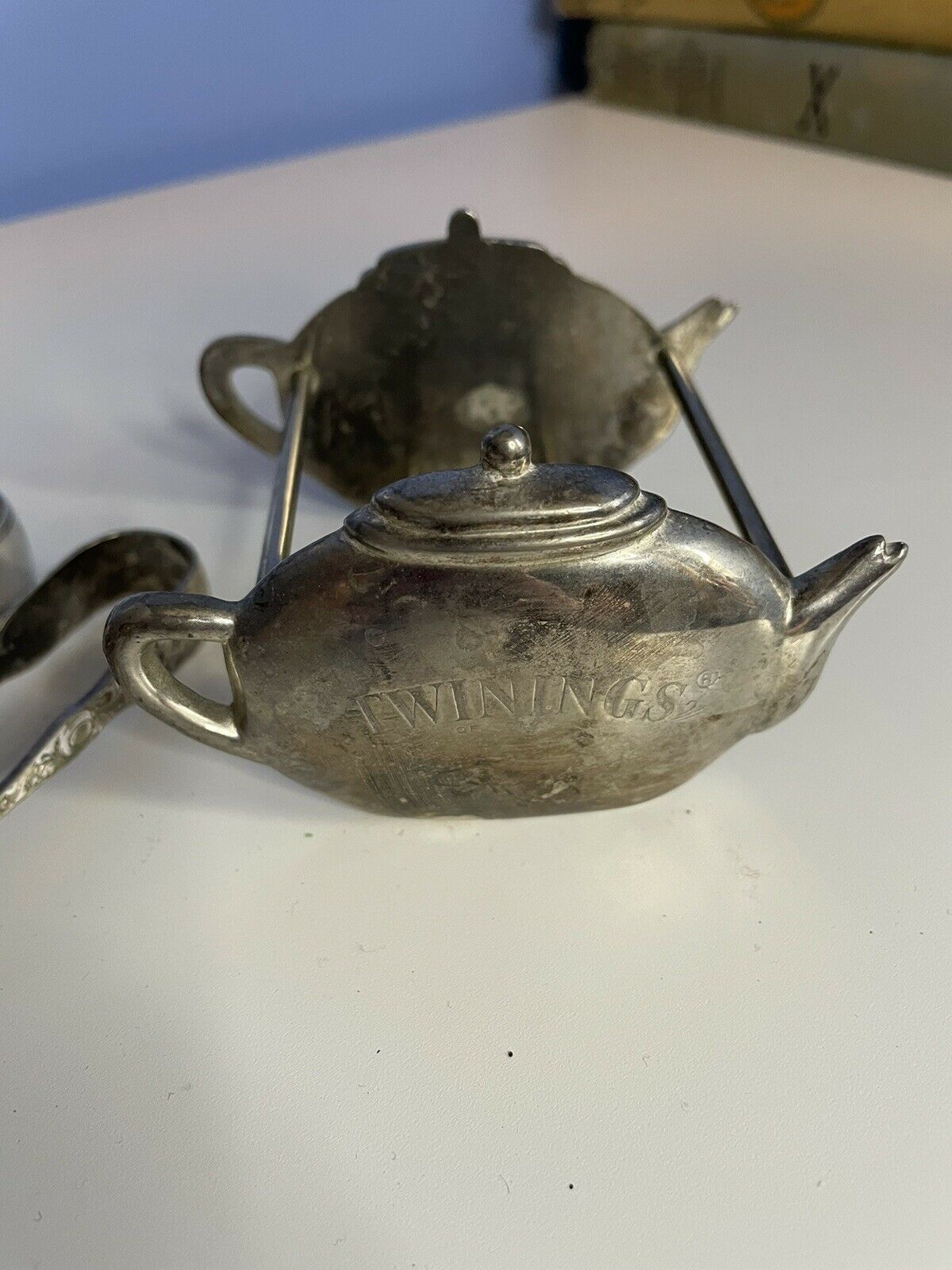 Antique Valuations: Twinings Silver Plated Tea Caddy And Sugar Tongs