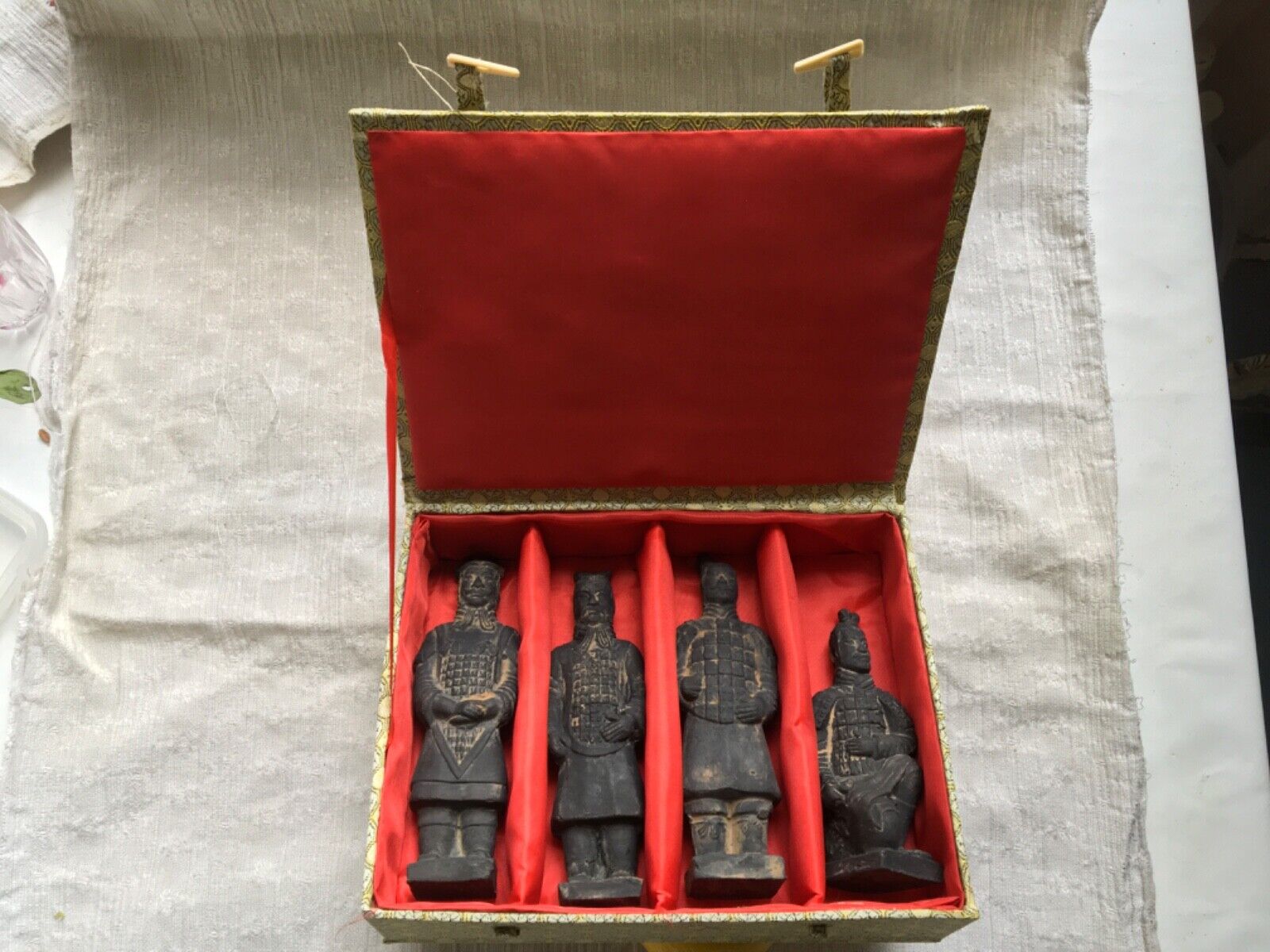 Antique Valuations: Ancient Chinese Terracotta Army Figurines (charcoal finish) x 4 in display box
