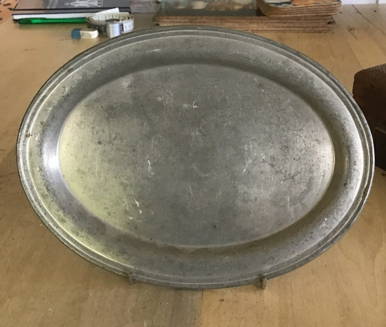 Antique Valuations: Small Antique Pewter Oval Charger Plate