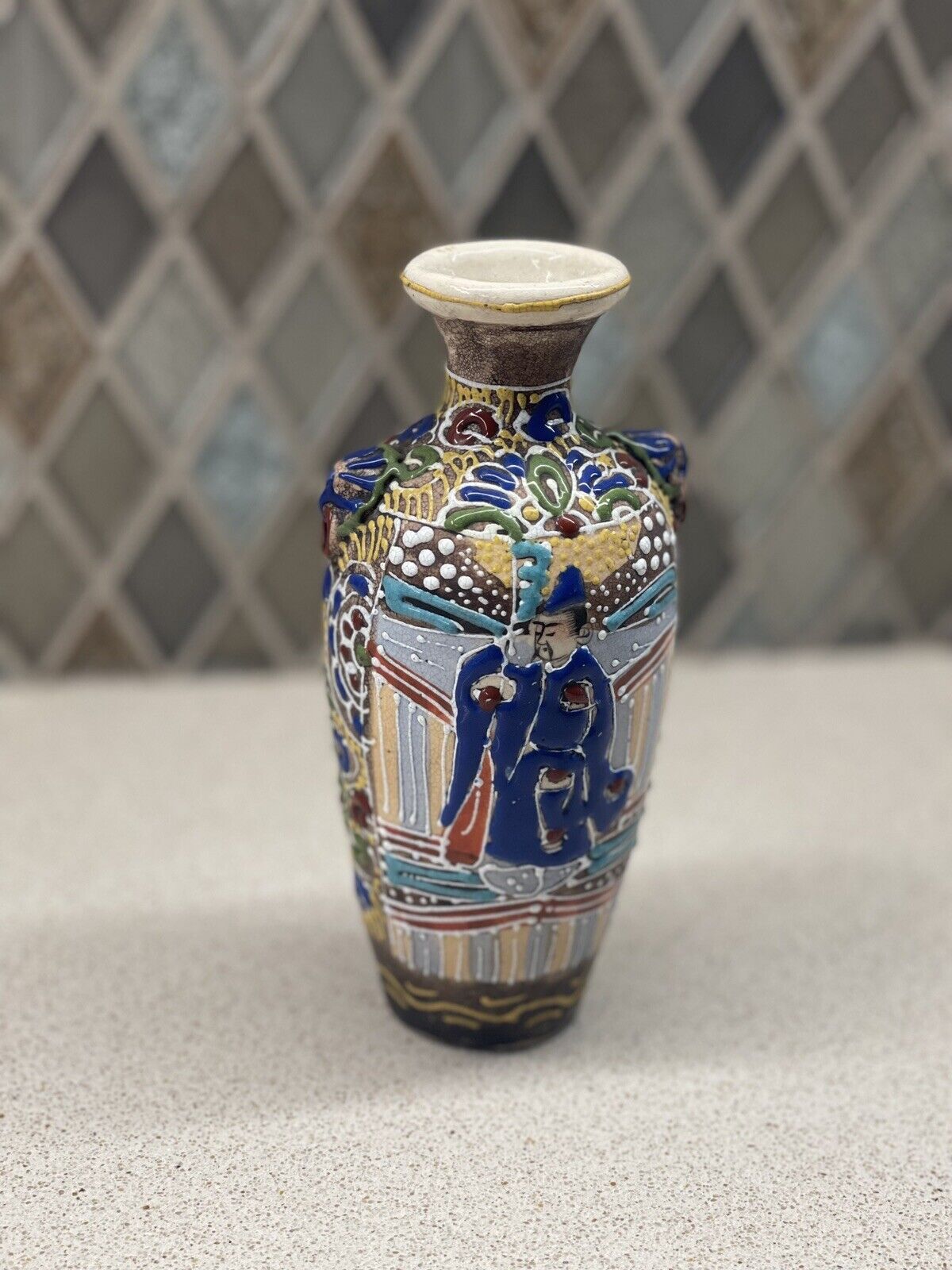 Antique Valuations: Vintage Japanese Pottery Mini Vase Raised Enamel Hand Painted