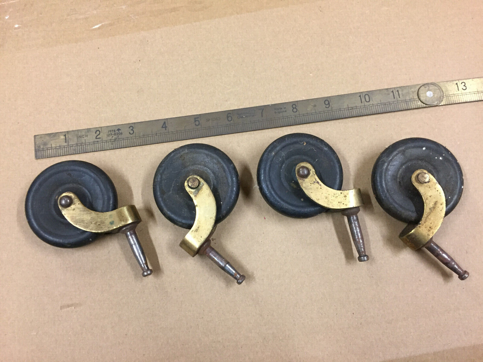 Antique Valuations: Vintage antique brass and bakelite casters victorian table good condition.