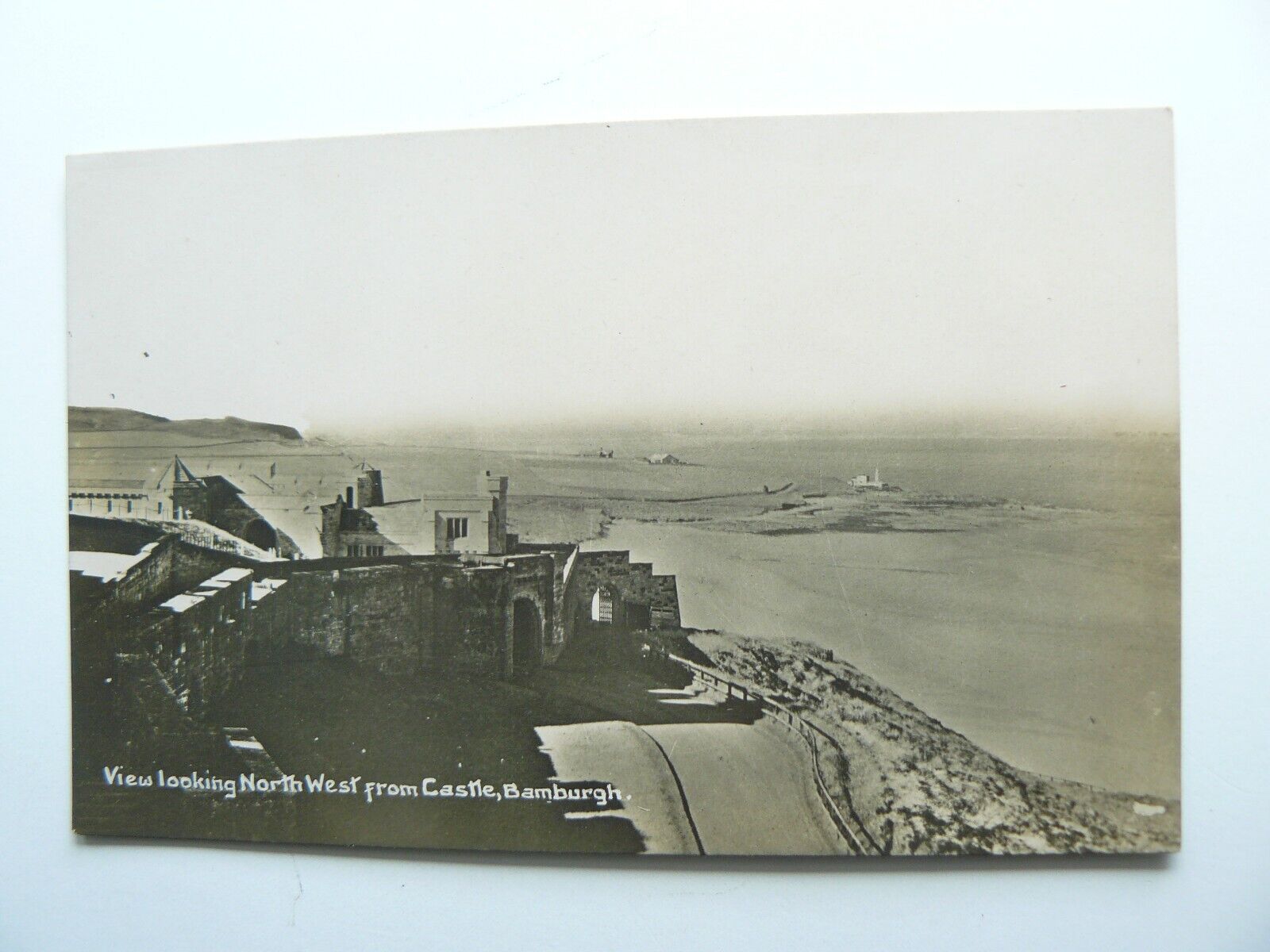 House Clearance - View looking North West from Castle Bamburgh Real Photo Service Northumberland