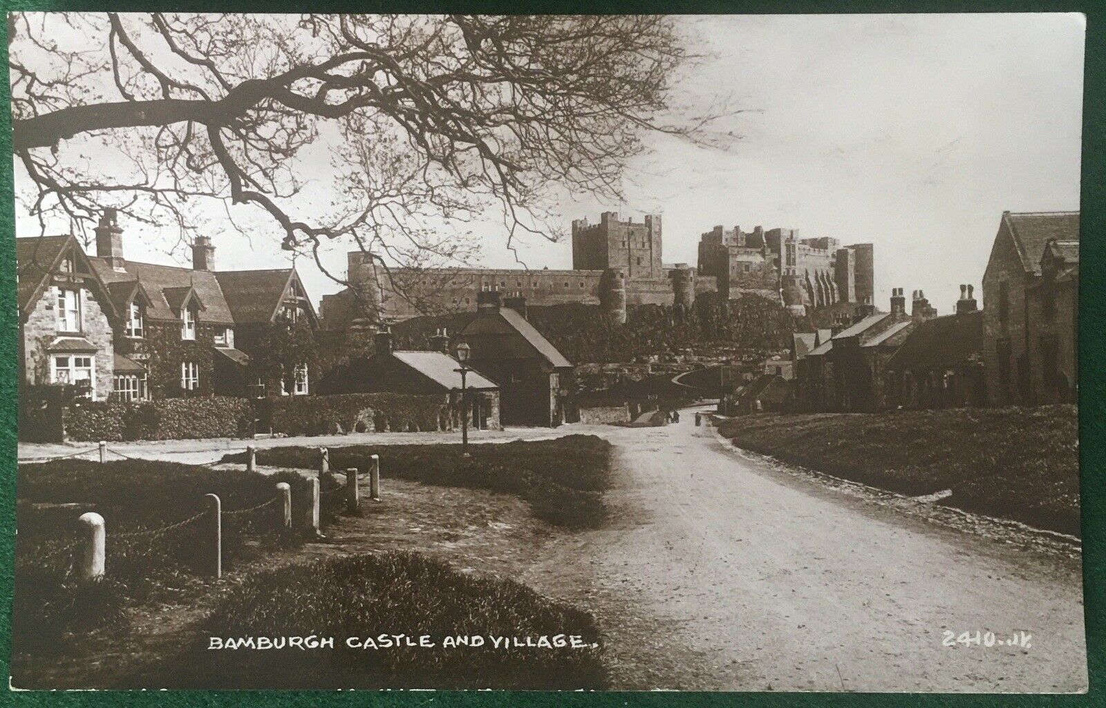 House Clearance - Banburgh Castle And Village. Real Photocard By Vallentine.c1915