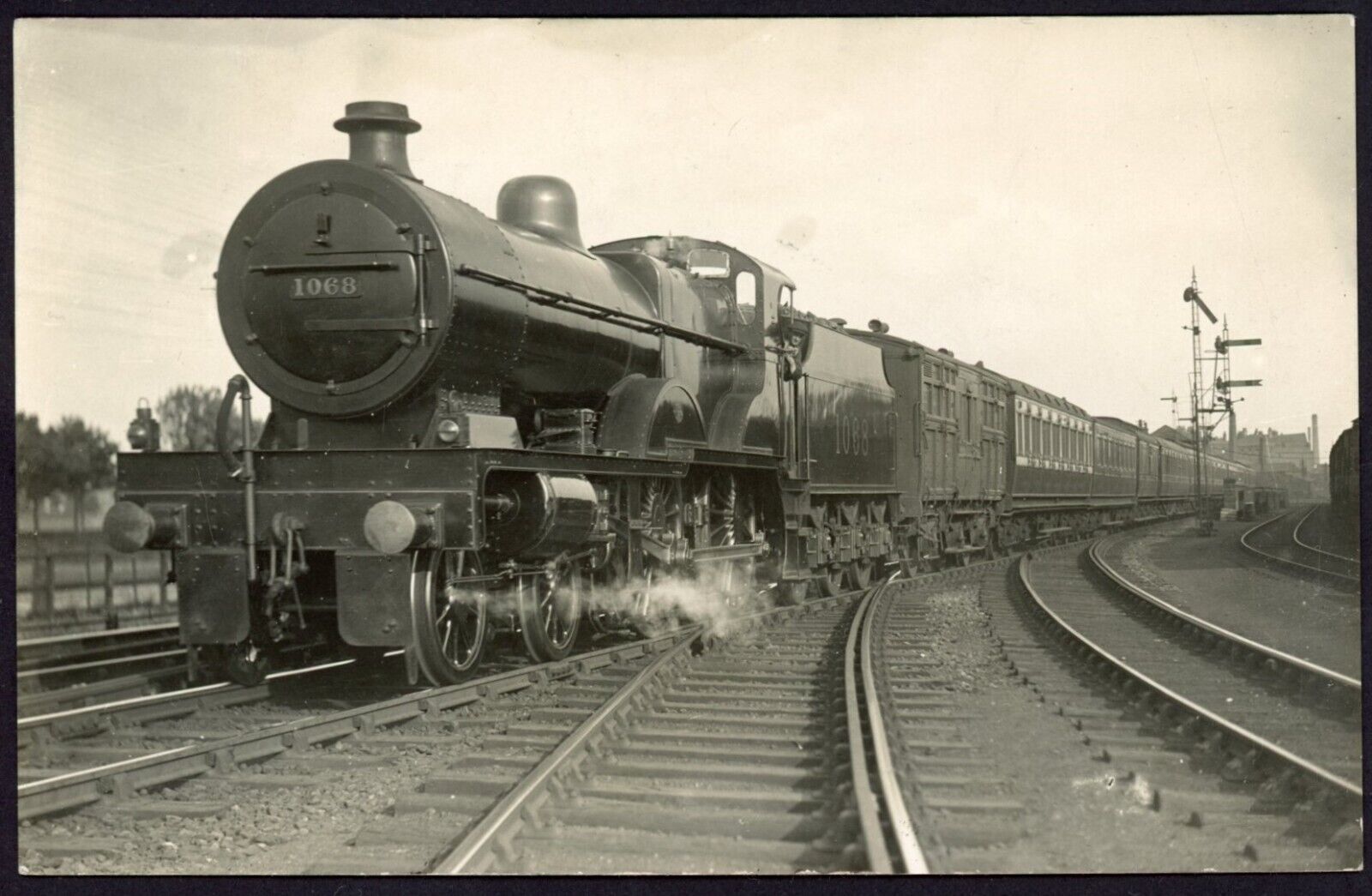House Clearance - Railway RP service LMS  4-4-0 No. 1068 at Port Carlisle with a St. Enoch train