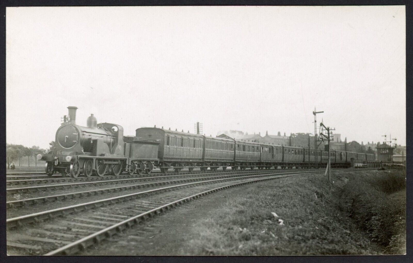 House Clearance - Railway RP service NBR 4-4-0 No. 1 at Port Carlisle with Silloth train