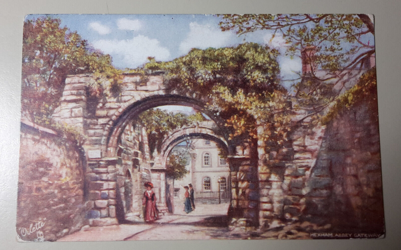 House Clearance - TUCKS OILETTE SERIES HEXHAM THE ABBEY GATEWAY CARD NO 7027 USED HEXHAM CANCEL