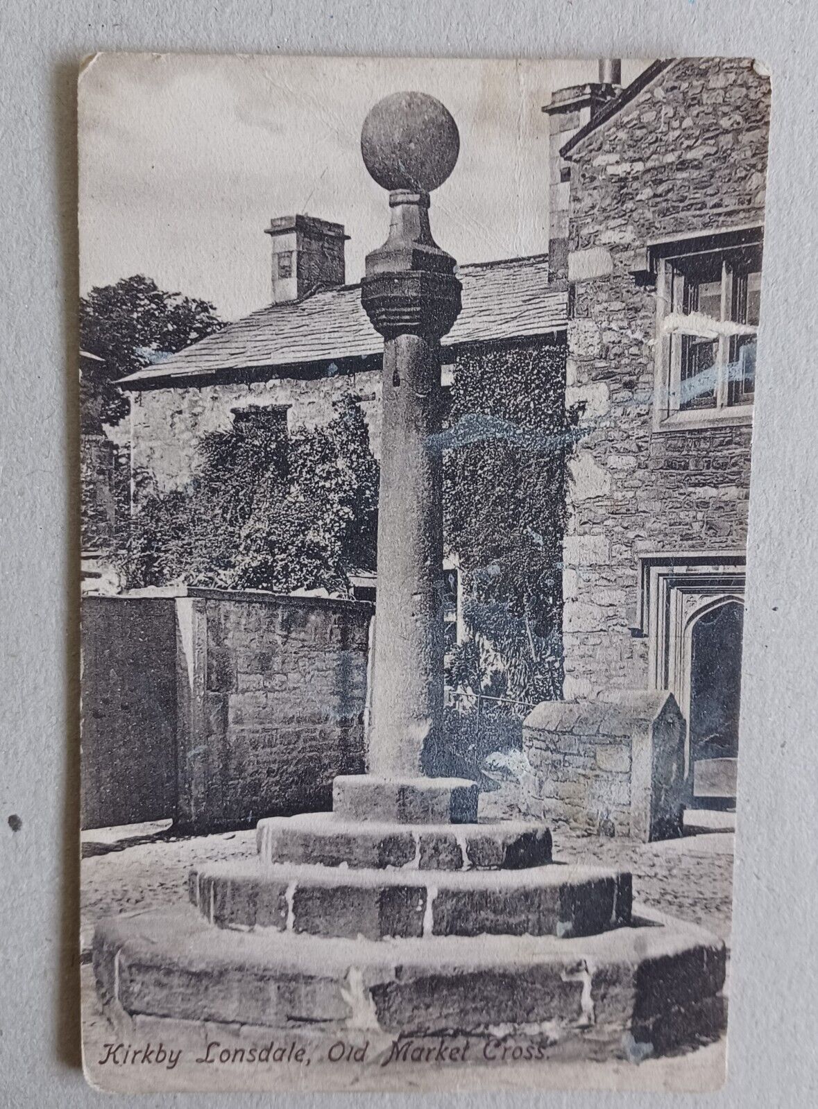 House Clearance - Cumbria. Kirkby Lonsdale. Old Market Cross. Black and white service.