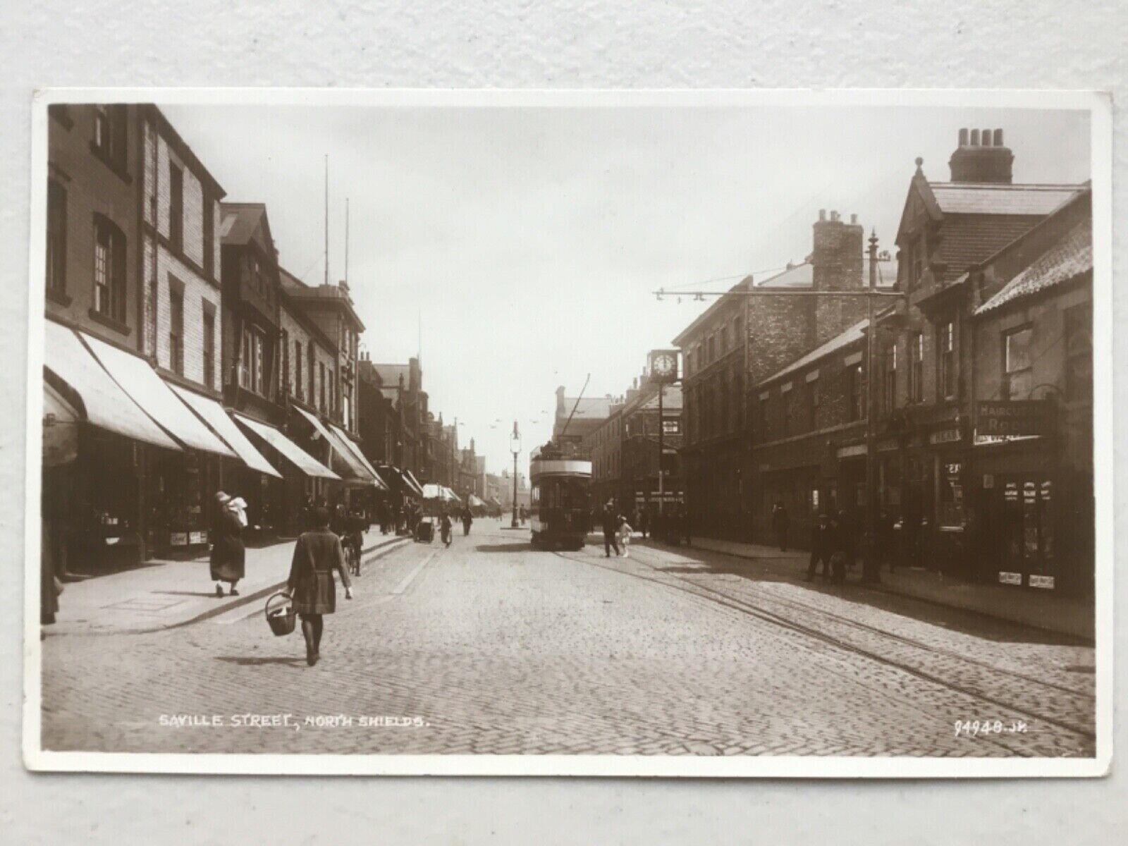 House Clearance - North Shields ‘Saville Street’ shops & tram car c.1920? RP service Tyne & Wear