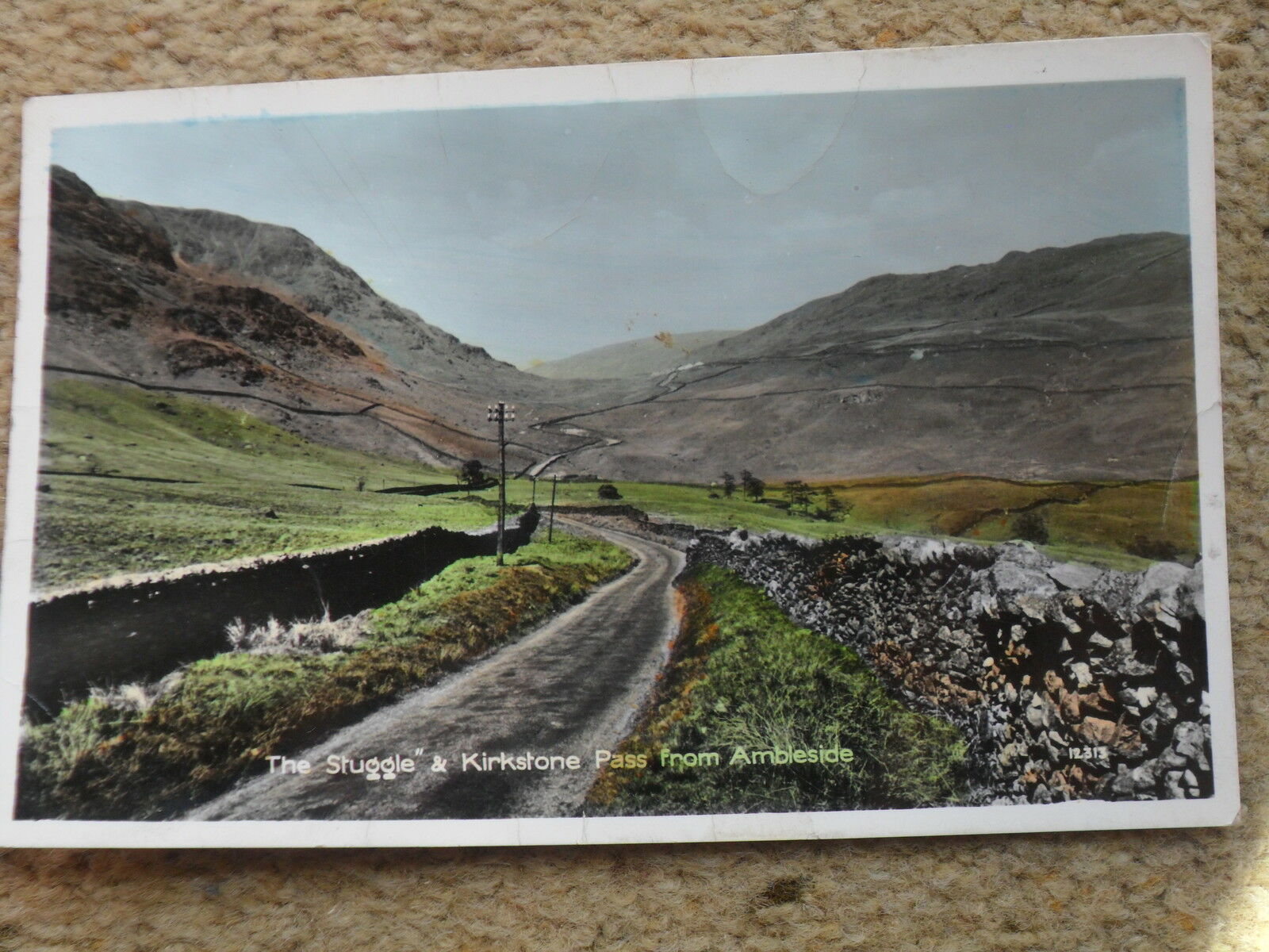 House Clearance - REAL PHOTO.POSTCARD "THE STUGGLE" AND KIRKSTONE PASS FROM AMBLESIDE.NOT POSTED.
